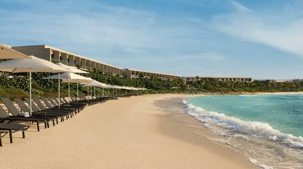 Editorial illustration for Hilton Shifts Two Riviera Maya Resorts to All-Inclusive, Creating Distinct Adult and Family Options